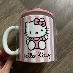 Hello kitty mug with topper